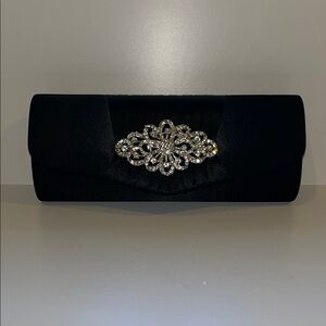 Elegant Black Clutch with Silver Embellishment